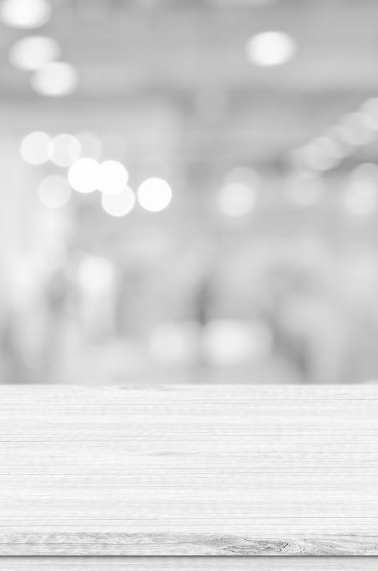 Empty white table top, counter over blur white bokeh light background. wooden shelf for product display, banner or mockup.